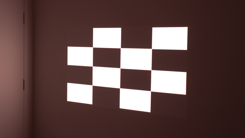 Hisense C1 checkerboard in a white room